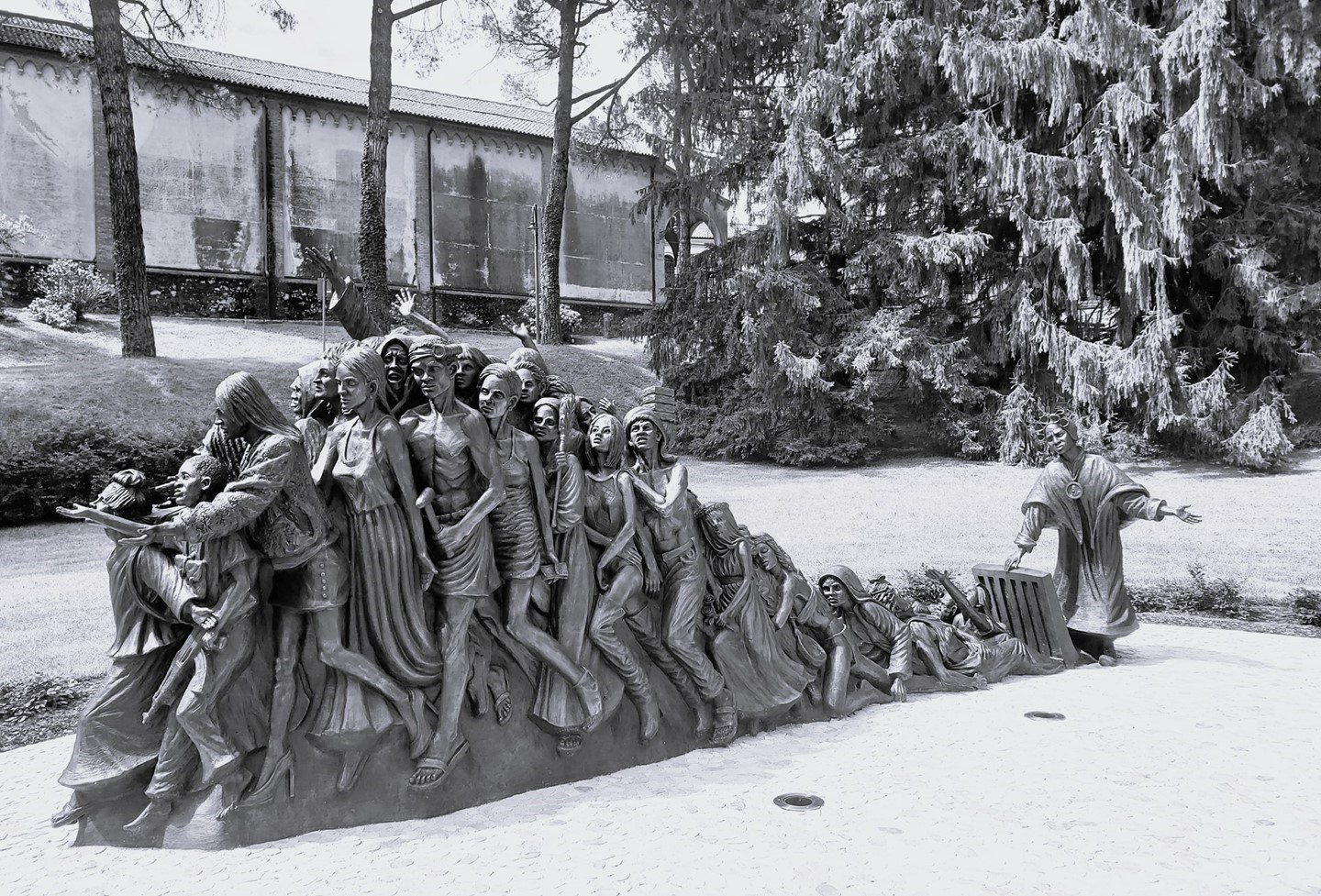 sculpture of people being released from captivity