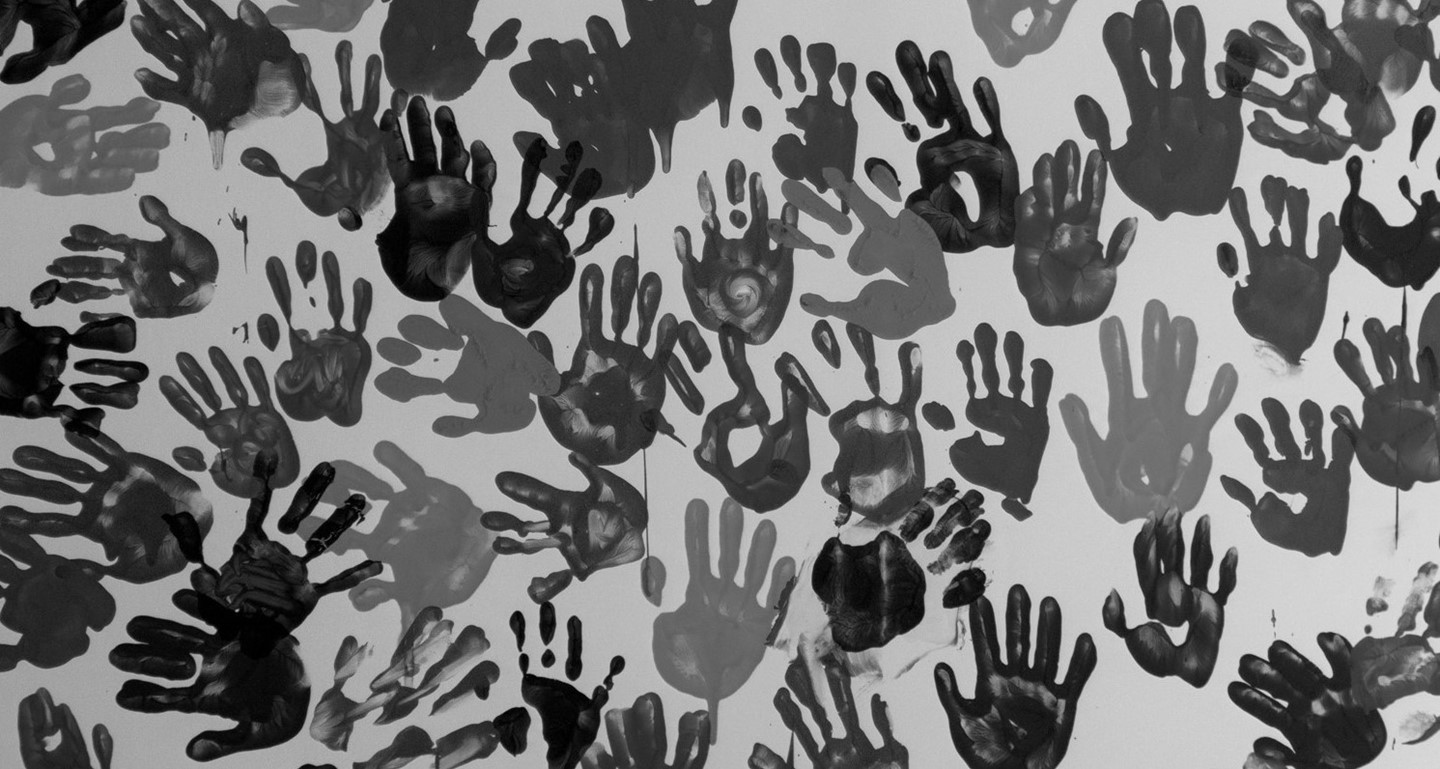 picture of painted hand prints on a wall