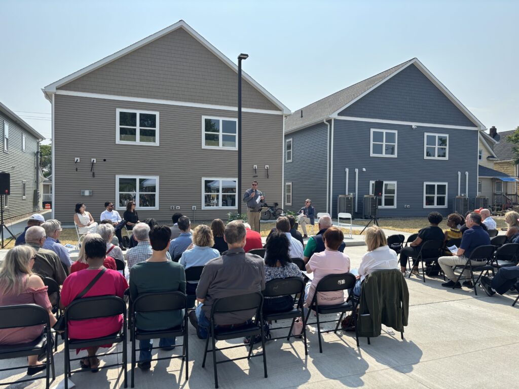 ribbon cutting ceremony opening new affordable housing